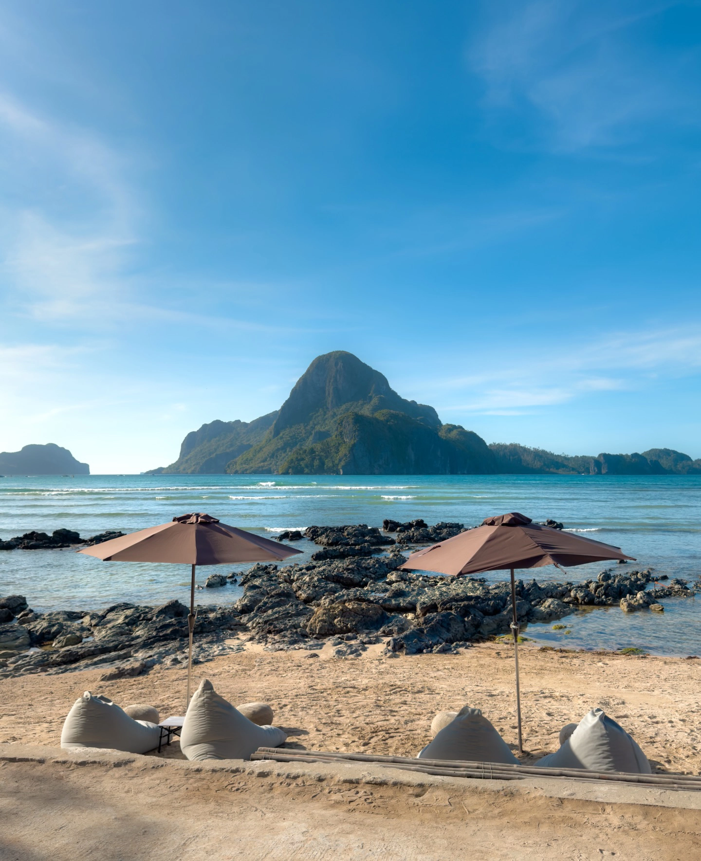 Caalan Beach sun loungers and a view of Cadlao Island from Morgan Villas.